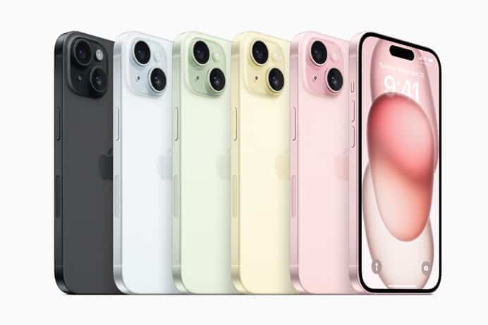 Een rij verschillende gekleurde iPhones op een witte achtergrond.